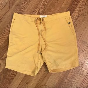 WRK-  Work.Rest.Karma Swim Shorts in a soft yellow color. Size 36
